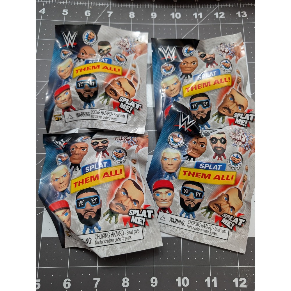 WWE Blind Bag Mini Splats Head Stretchy Action Figures 4 bags sealed Walmart